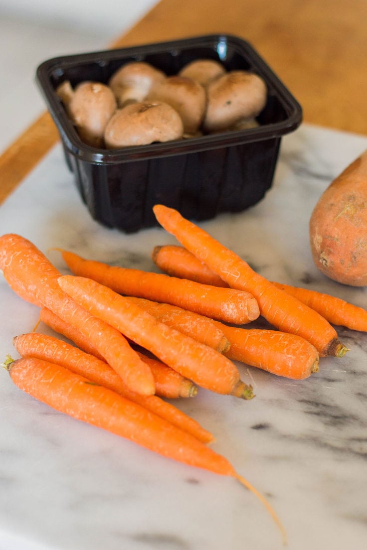 Peeling carrots.