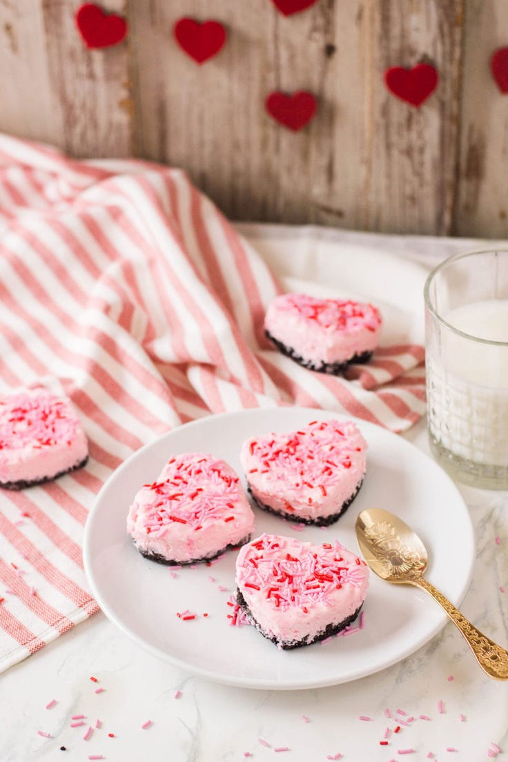 Heart-shaped mini cheesecakes Valentine’s Day dessert.