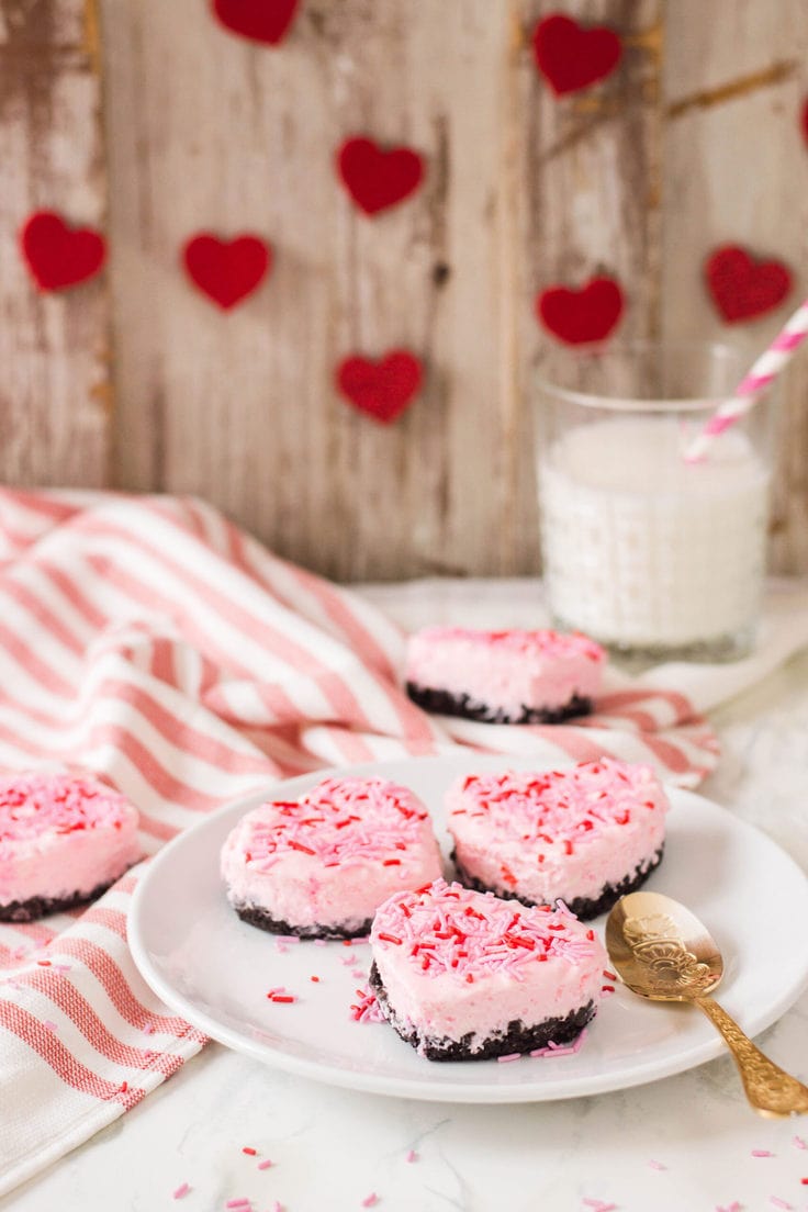 Heart-shaped mini cheesecakes Valentine’s Day dessert.