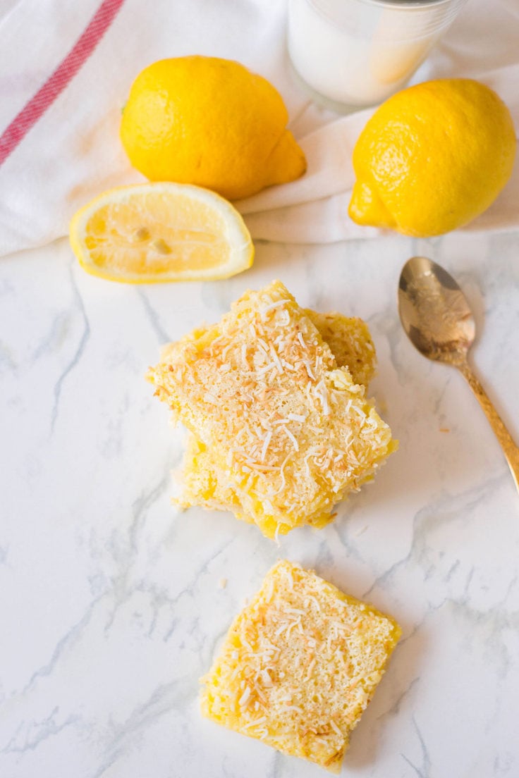 Detail of toasted coconut on top of the bright yellow lemon squares.