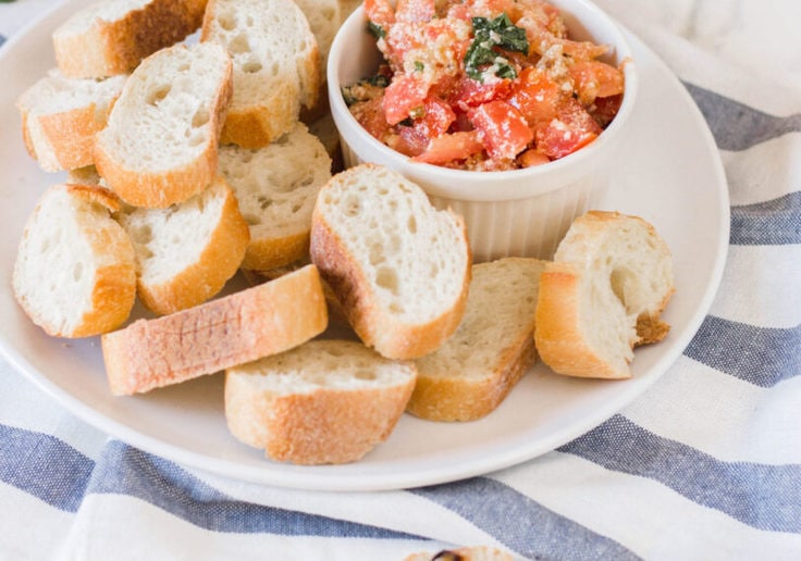 This easy bruschetta appetizer is quick to make and yields the most delicious results - restaurant-style! #homemadebrushcetta