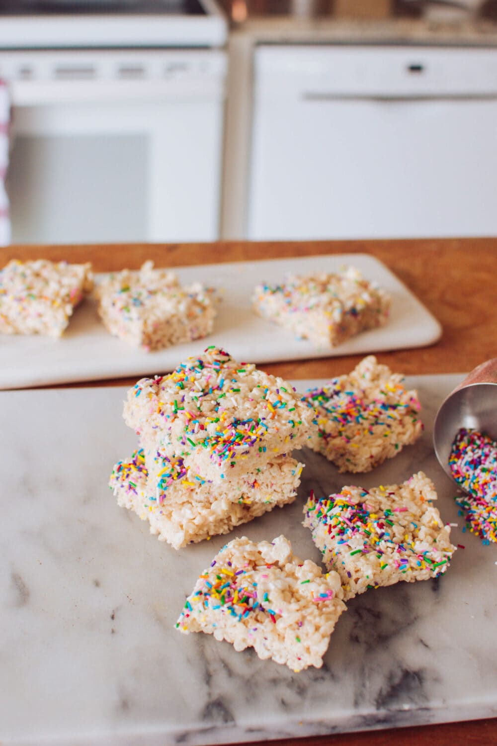 A delicious batch of Funfetti Rice Krispie Squares - in this recipe, we're giving a classic dessert a colourful makeover. And it's so simple to make!