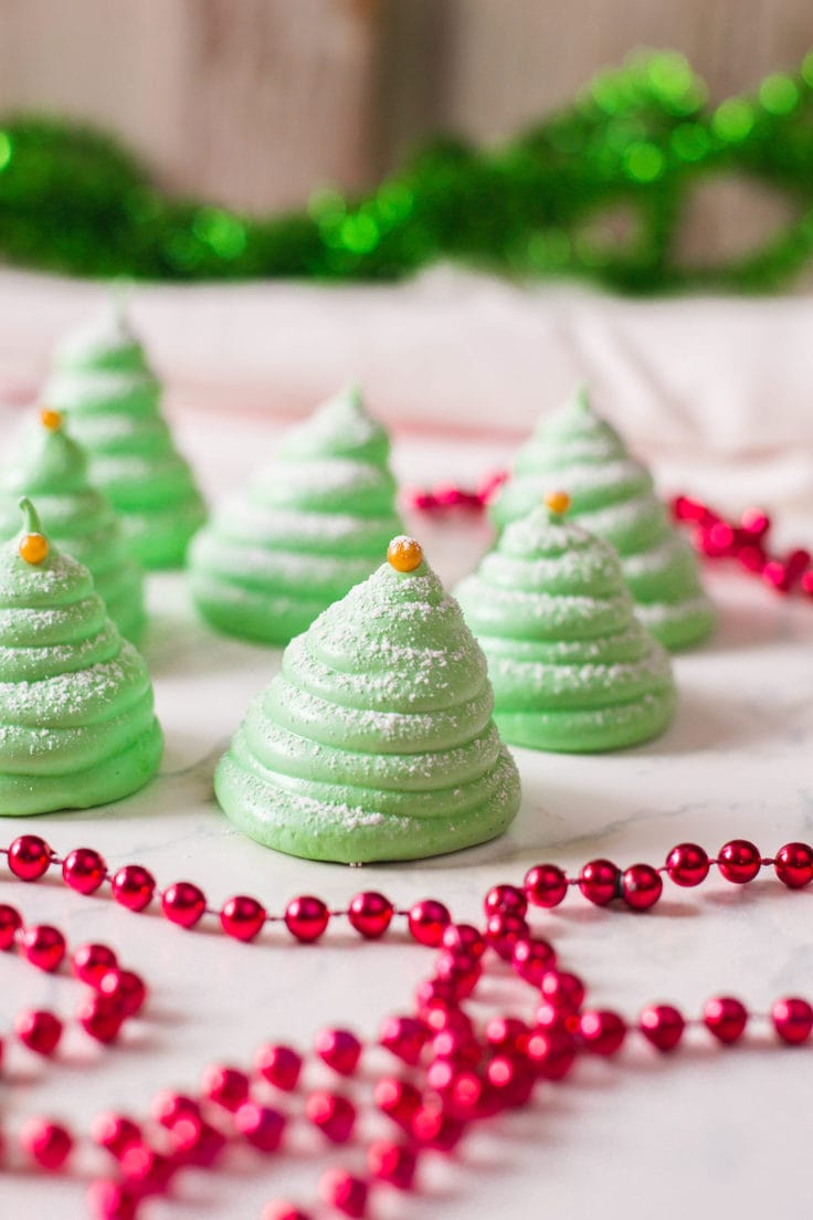 Green Meringue cookies that look like Christmas trees