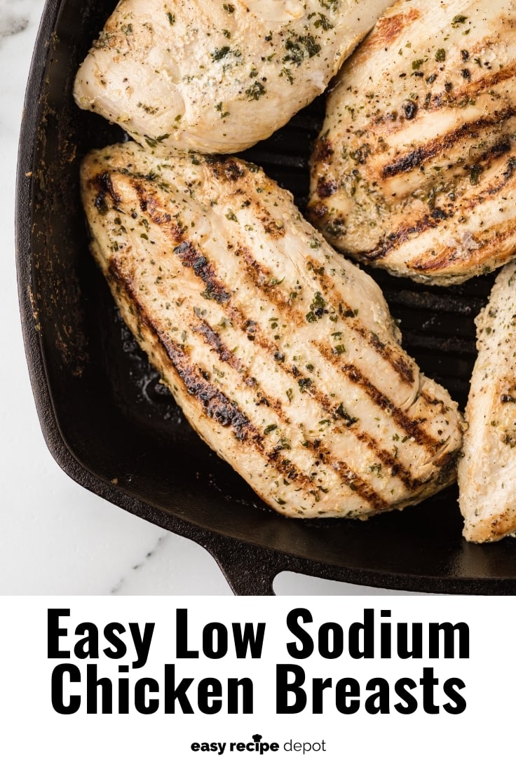 Low-sodium seasoned chicken breasts in a cast-iron skillet.