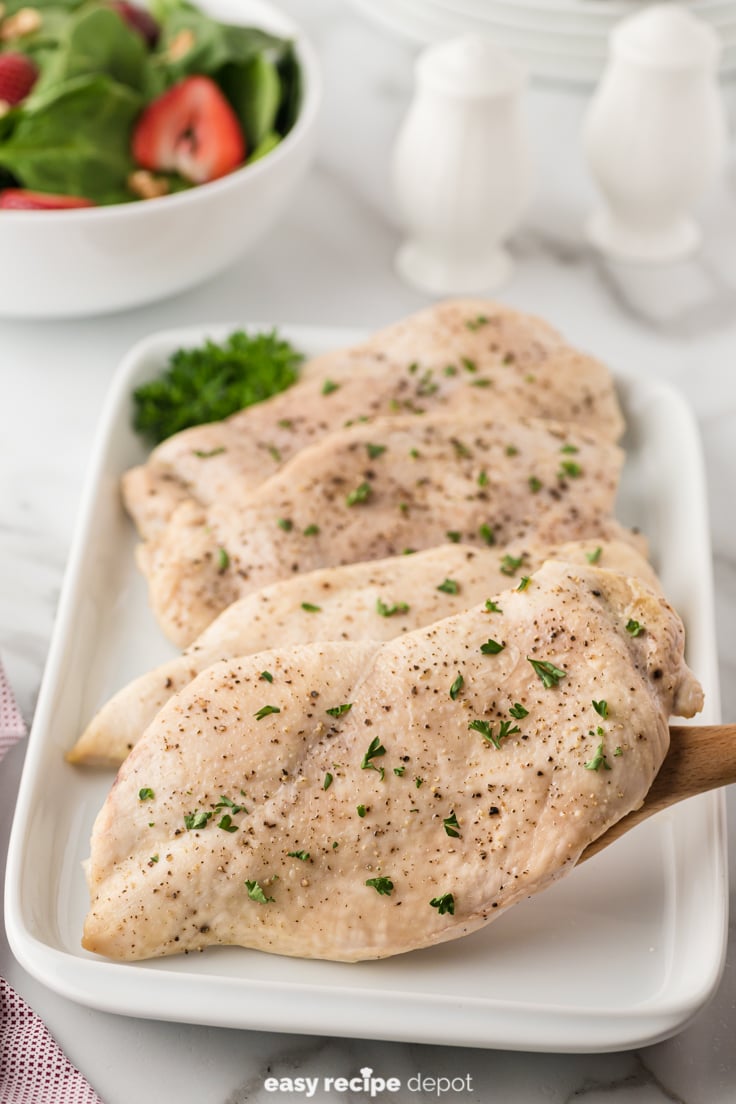A serving of boneless skinless chicken breasts.