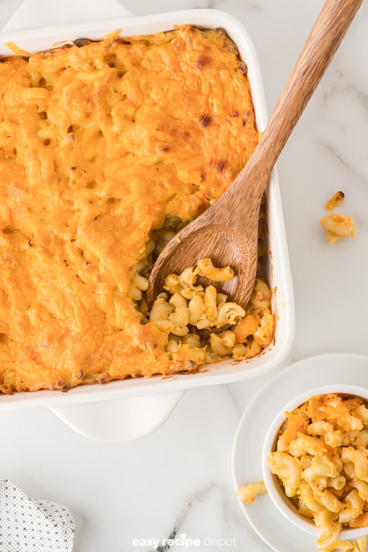 baked macaroni scooped out into a bowl