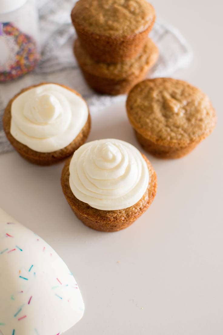 Aeriel view of vanilla frosting on vanilla cupcakes