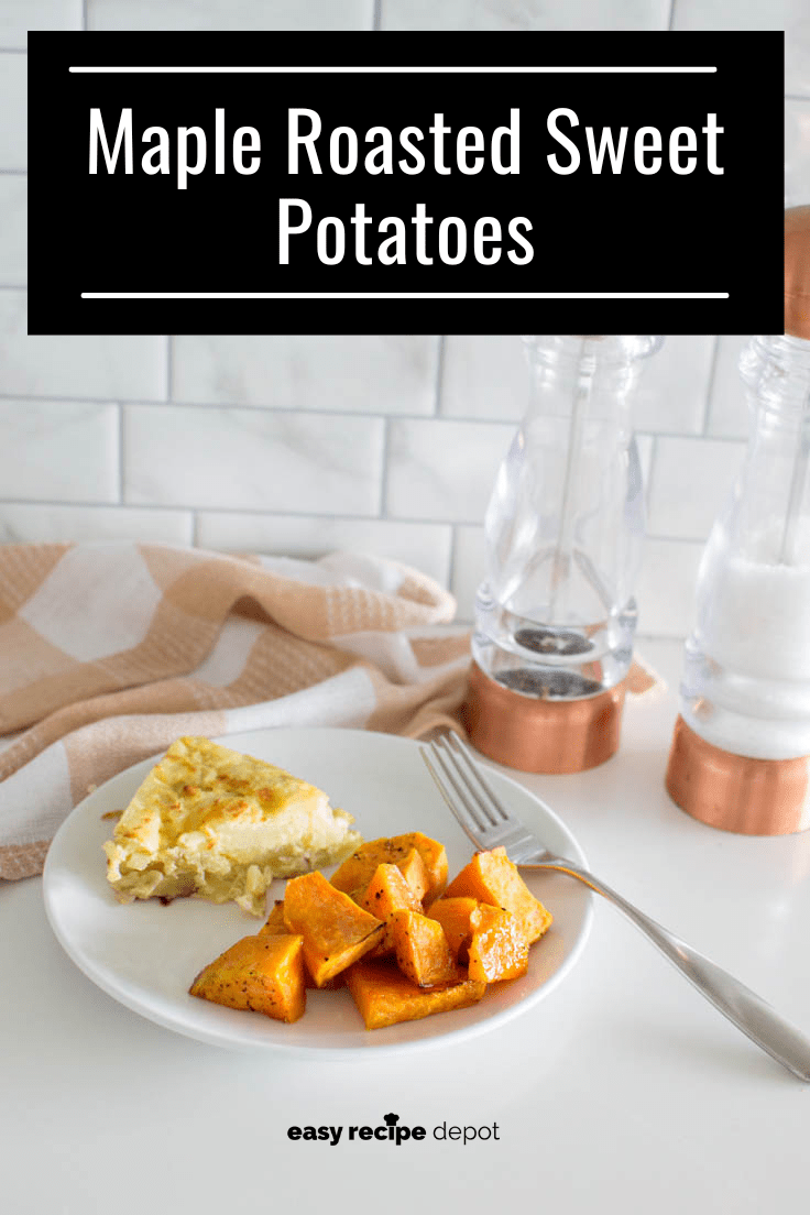 Maple roasted sweet potatoes being served as a side dish on a white plate with a frittata