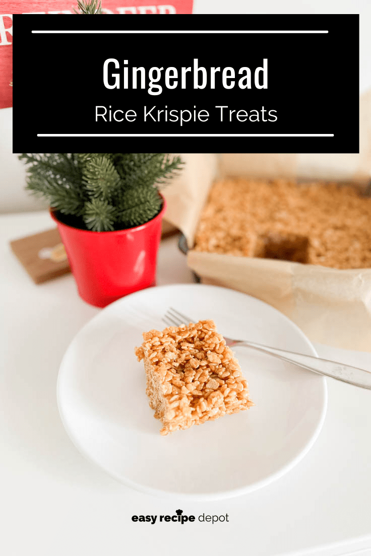 Gingerbread Rice Krispie Square served on a white plate with a miniature tree in the background