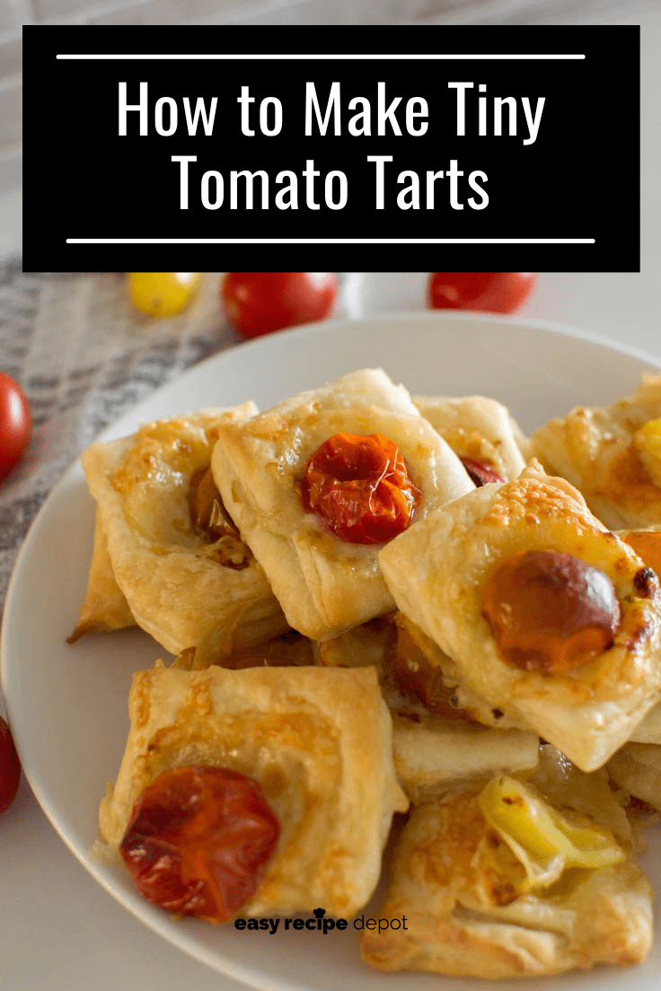 Tiny Tomato Tarts stacked on top of each other on a white plate, surrounded by additional cherry tomatoes
