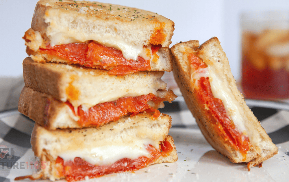 A stack of pepperoni grilled cheese sandwiches 