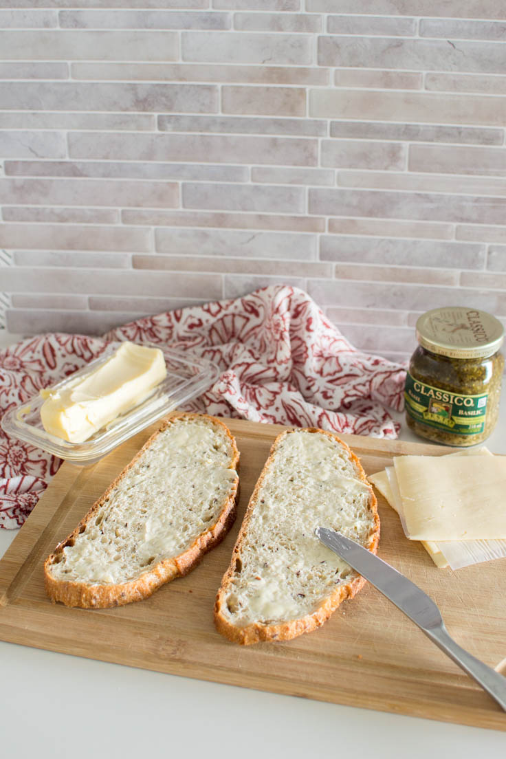 Adding butter to artisanal bread