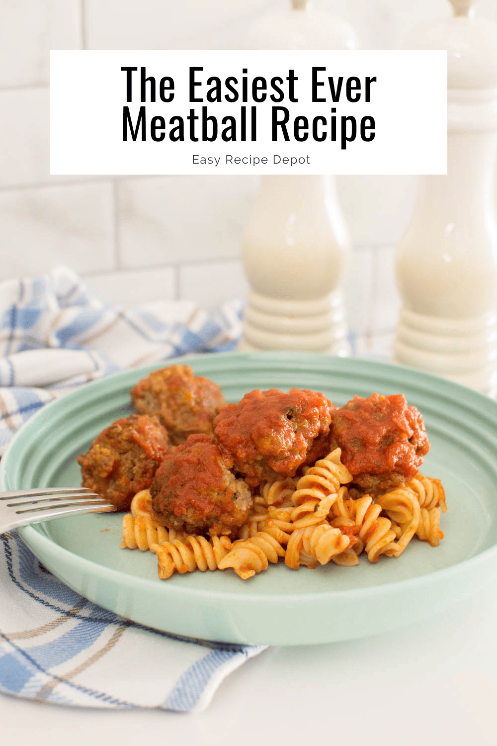 Our easy meatball recipe on top of past and covered in marinara sauce