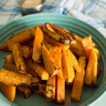 Aerial view of a bowl full of homemade sweet potato fries