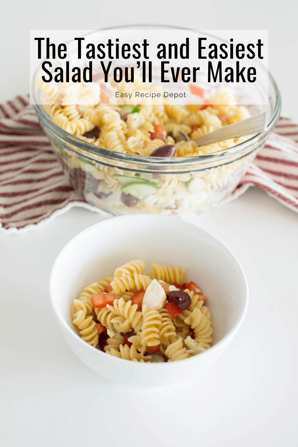 Homemade pasta salad being served in a white bowl