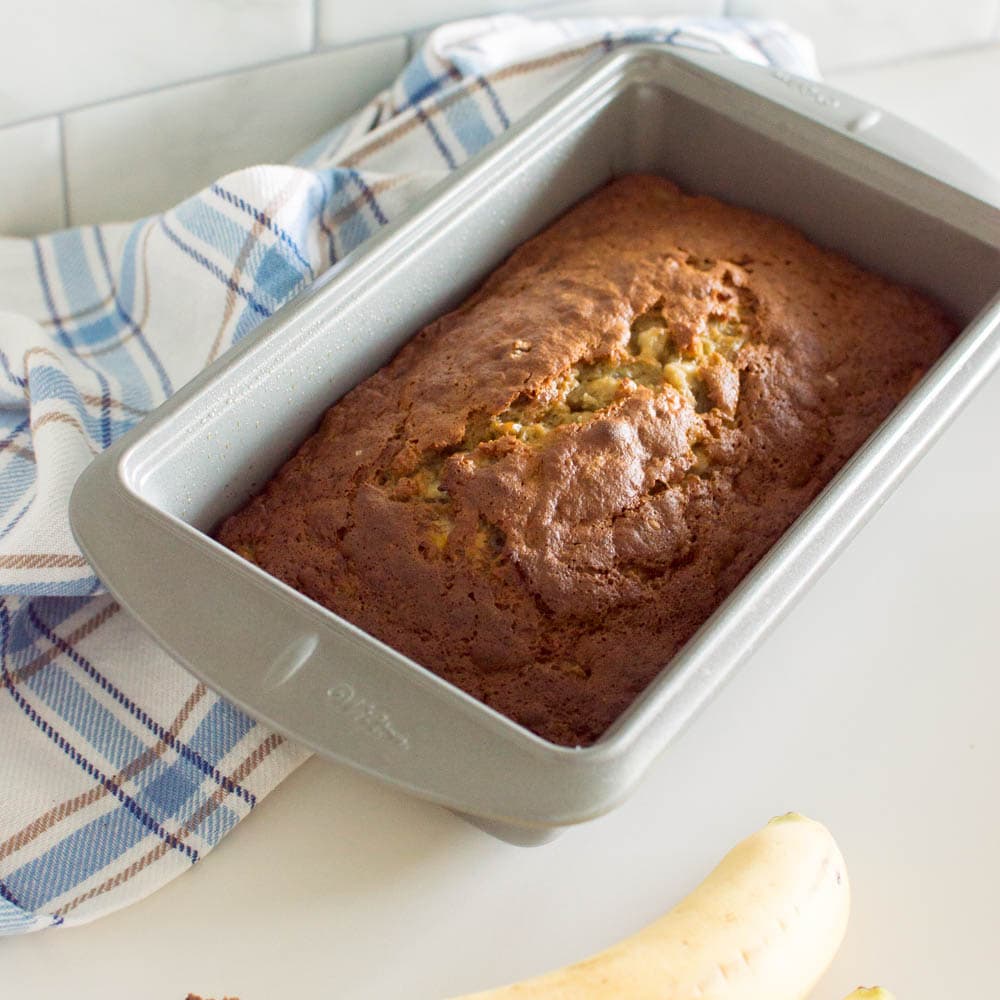 Aerial view of homemade banana bread in a loaf pan