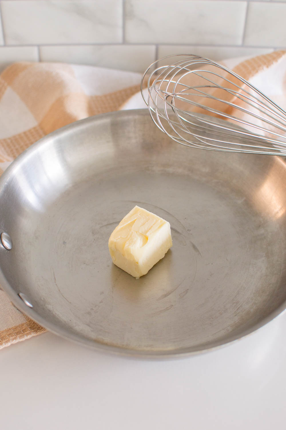 Melting butter on a large skillet